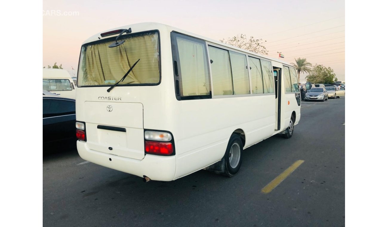 Toyota Coaster 4.2L Diesel, Manual, MP3 Interface,CD Player, Tuner Radio, Apenas para ANGOLA