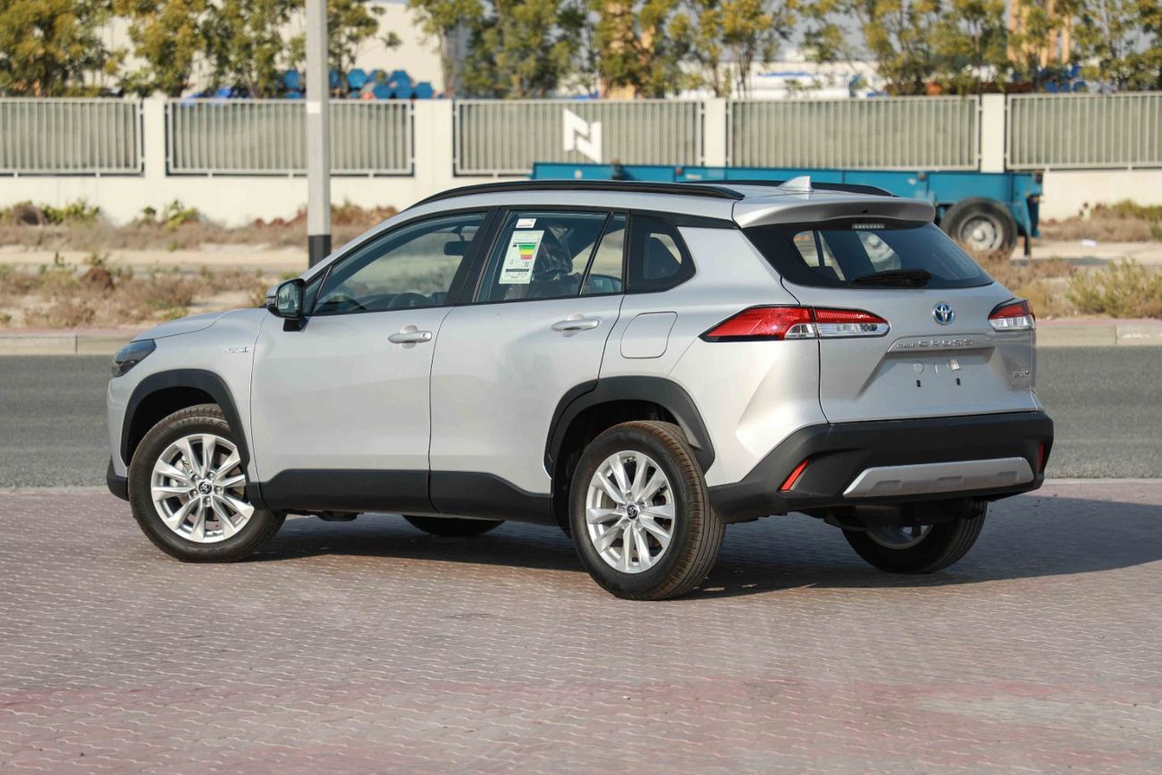 تويوتا كورولا كروس 1.8 Hybrid MID - Silver inside Red | Export Only