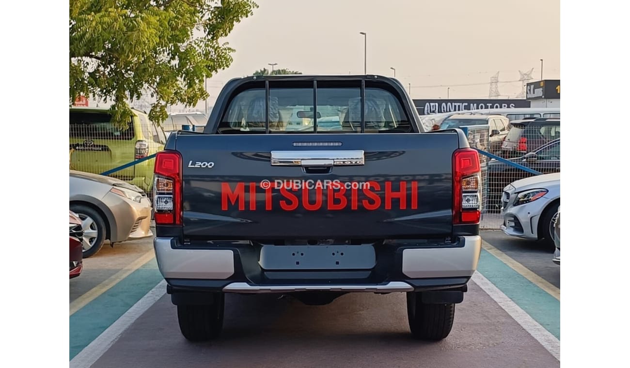 Mitsubishi L200 GLX 2.5L Diesel / M/T / 4WD / Black Rims / Streering Vol Control (Code # L2DDB)
