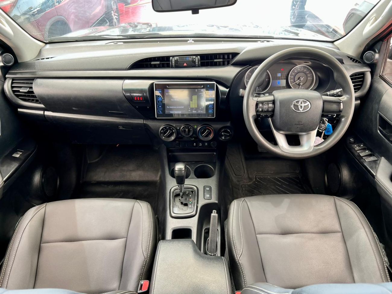 تويوتا هيلوكس The Toyota Hilux is a legendary, mid-size pickup truck known for its exceptional ruggedness, durabil