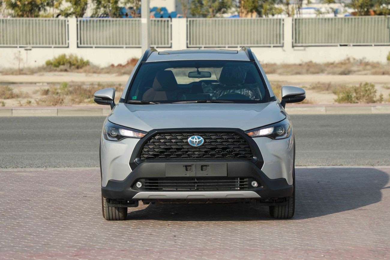 تويوتا كورولا كروس 1.8 Hybrid MID - Silver inside Red | Export Only