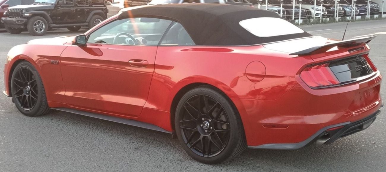 Ford Mustang Ford mustang ecoboost convertible V4  Body kit GT Model 2019 Price: 68000 Dhs Mileage: 44000 Mi Spec