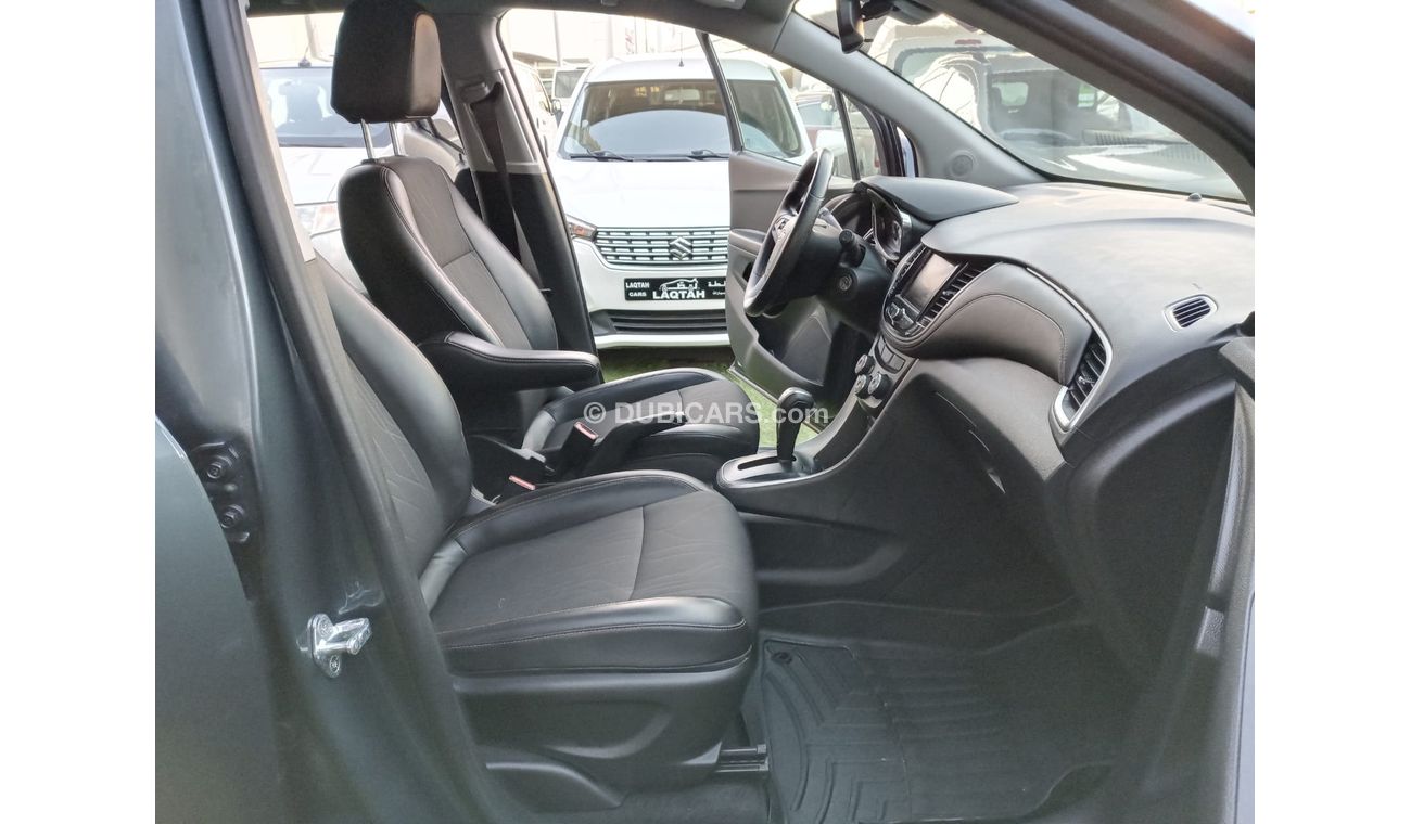 Chevrolet Trax 1400 CC 2021 model, gray color, cruise control, rear spoiler, screen, rear camera, in excellent cond