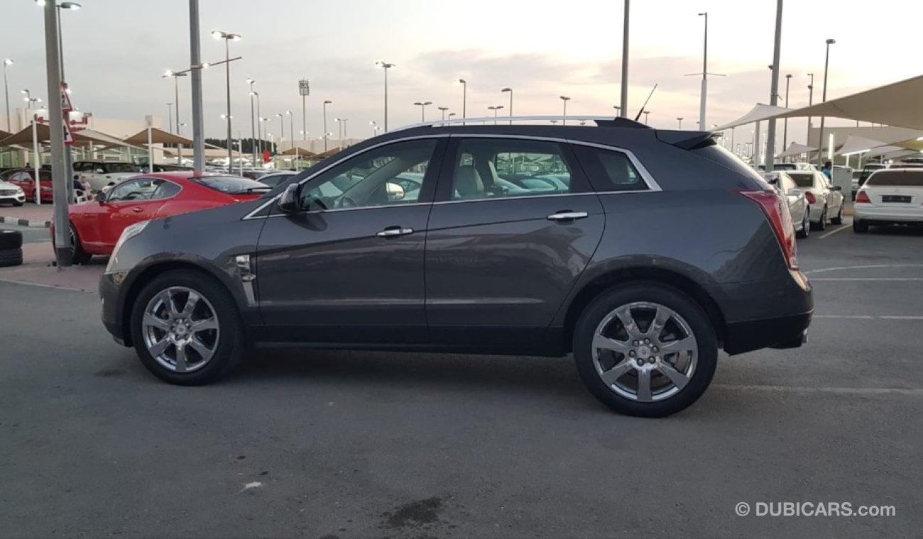 Cadillac SRX Caddillac SRX model 2011 GCC car prefect condition full option low mileage panoramic roof leather s