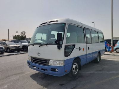 تويوتا كوستر (RAMADAN OFFER) TOYOTA COASTER BUS RHD 2011 MODEL 4.0 L DIESEL AUTOMATIC(PM53682)