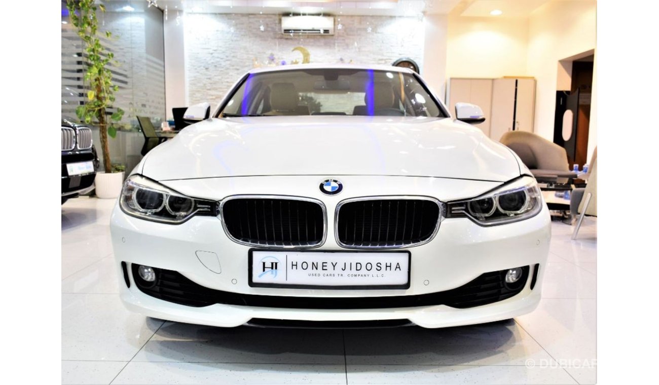 BMW 320i ONLY 99000 KM!!!  BMW 320i 2013 Model!! White Color! GCC Specs