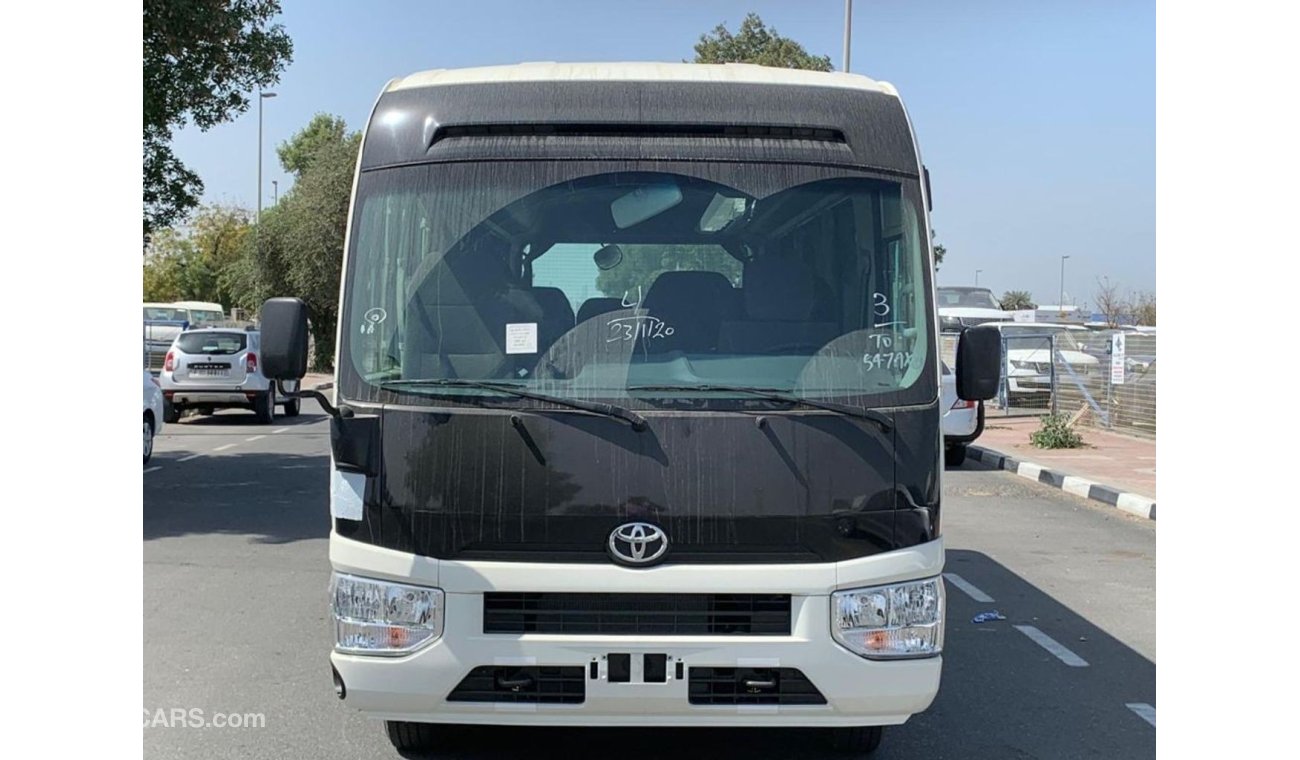 تويوتا كوستر 4.2L Diesel 22 seater Full Option Automatic door