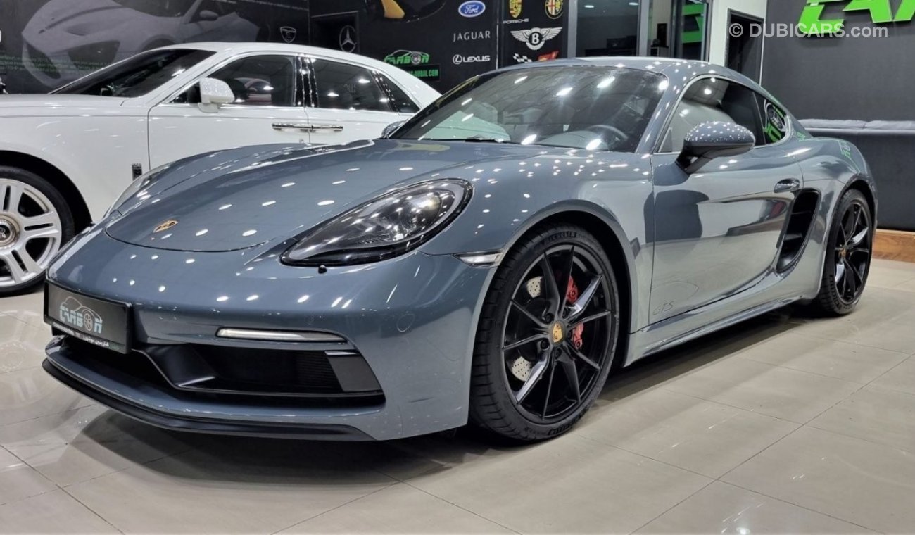 بورش كايمان 718 PORSCHE CAYMAN 718 GTS IN PERFECT CONDITION WITH ONLY 22K KM FULL SERVICE HISTORY FOR 295K AED