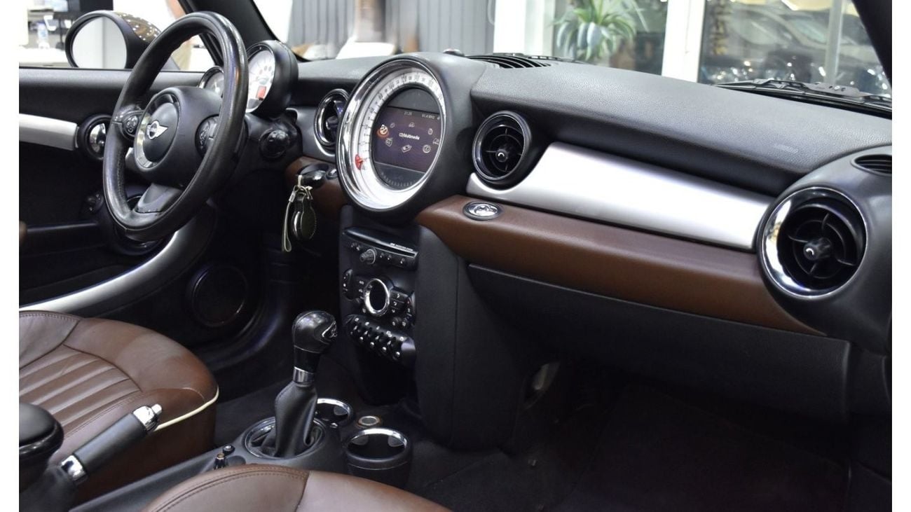 Mini Cooper S EXCELLENT DEAL for our Mini Cooper S Convertible ( 2011 Model ) in Brown Color GCC Specs