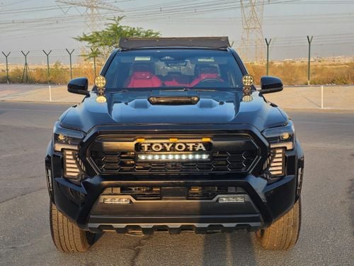 Toyota Tacoma SR5 2024 Model 2.4L normal engine ,Push button , leather seats and low mileage
