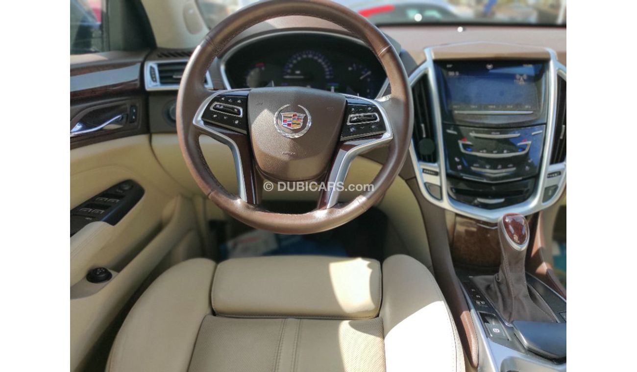 Cadillac SRX 2014 model GCC specs full options panorama clean car 3.6ltr