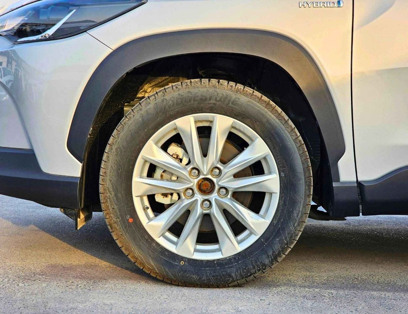 Toyota Corolla Cross HYBRID /1.8L A/T / FULL OPTION / SUNROOF, LEATHER/ 17" ALLOY WHEELS/CODE#XLE