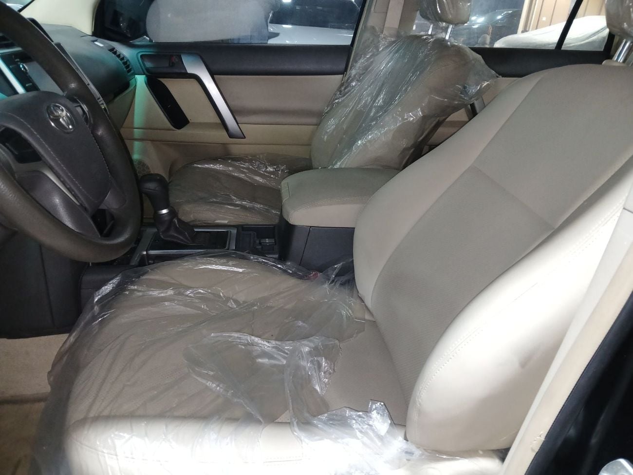 Toyota Prado TX-L 2.7L v4 petrol Engine Colour Black Transmission Automatic Interior Beige Leather seats 7seats back C