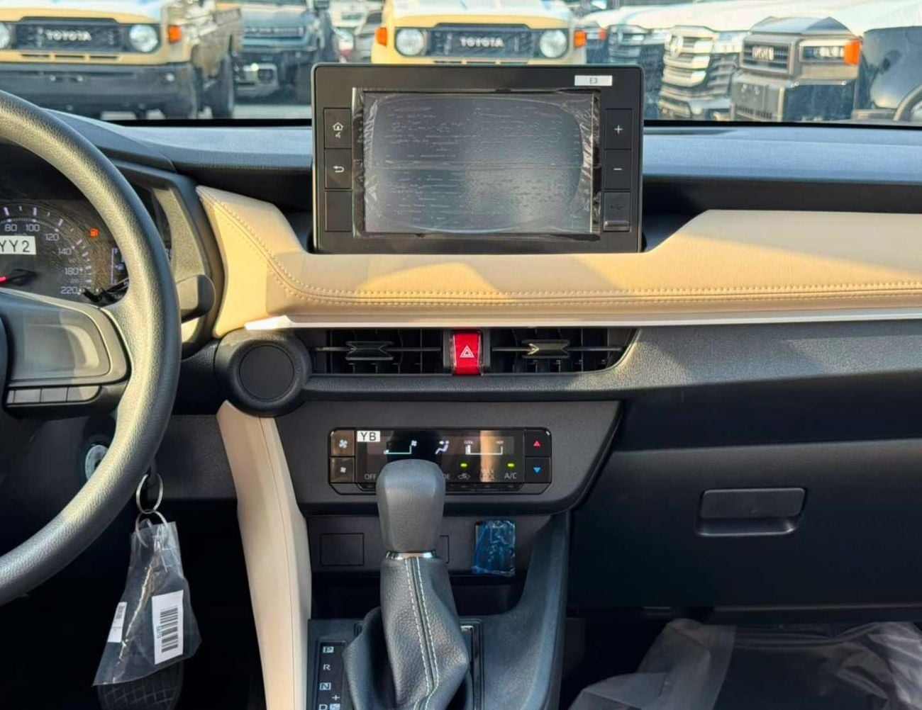 تويوتا يارس E  STANDRAD OPTION || 1.5L PETROL V4 | FABRIC SEATS | DVD | REAR PARKING SENSOR (CODE # YREO)