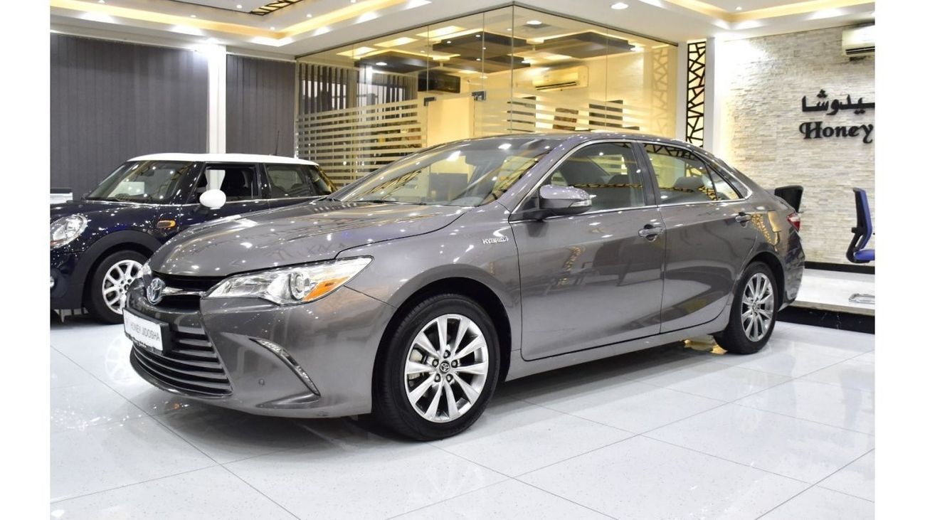 Toyota Camry EXCELLENT DEAL for our Toyota Camry LE Hybrid ( 2017 Model ) in Grey Color American Specs