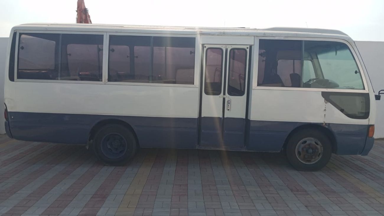 Toyota Coaster Petrol  / Excellent condition