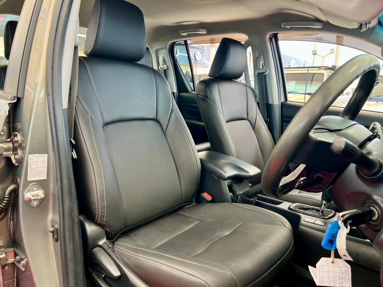 تويوتا هيلوكس The Toyota Hilux is a legendary, mid-size pickup truck known for its exceptional ruggedness, durabil