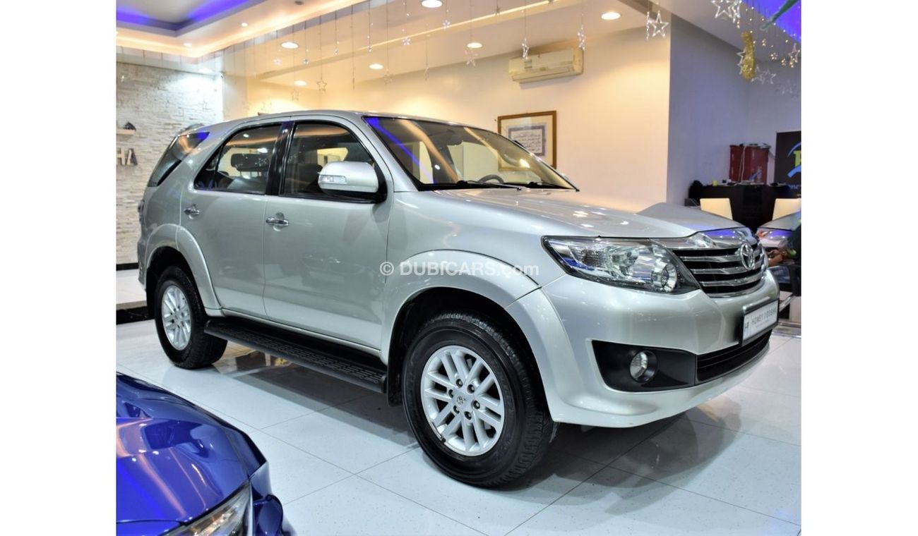 تويوتا فورتونر EXCELLENT DEAL for our Toyota Fortuner SR5 ( 2013 Model! ) in Golden Color! GCC Specs