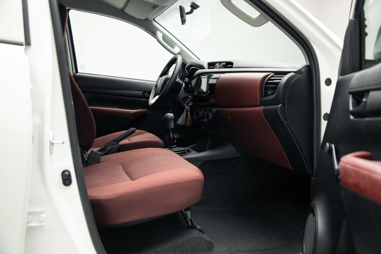 Toyota Hilux DLX 2.4L - Super White Inside Maroon | Export Only
