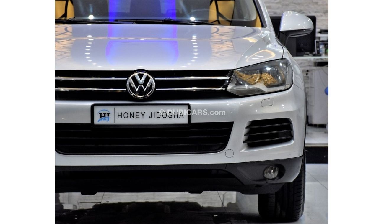 Volkswagen Touareg EXCELLENT DEAL for our Volkswagen Touareg ( 2012 Model ) in Silver Color GCC Specs