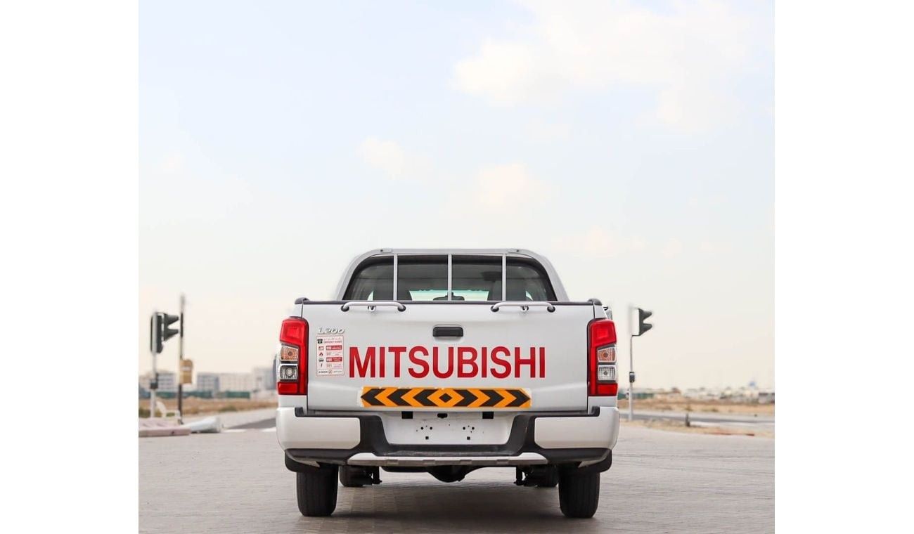 ميتسوبيشي L200 GL 2.4L (128 HP) Double Cab Utility Mitsubishi L200 2.4 L RWD 2020 GCC accident-free in excellent co
