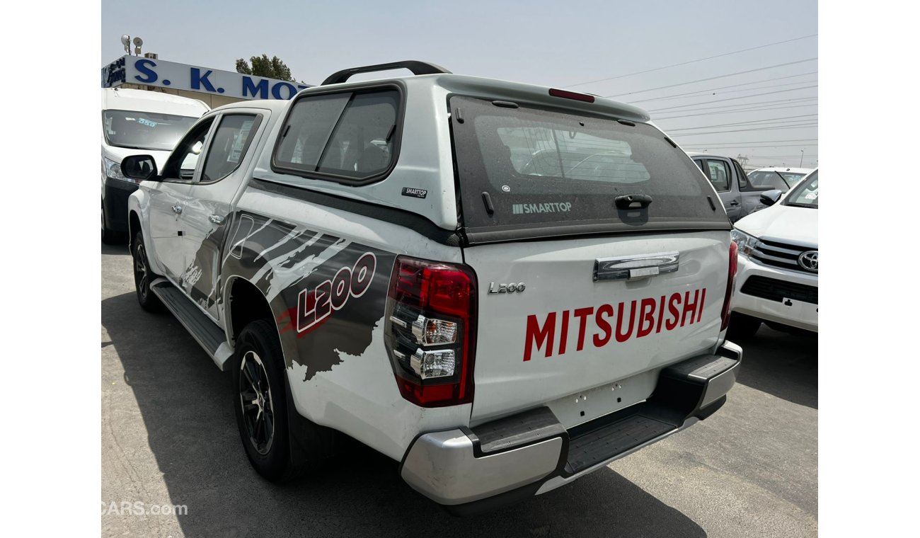 Mitsubishi L200 Euro4 / 2.5L Diesel. M/T Carry Body. Full Option with Black Rims.(CODE # MPL2)