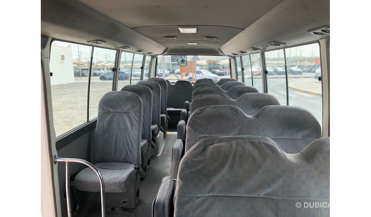 تويوتا كوستر Toyota coaster 30 seater bus Diesel, Model:2015. Excellent condition