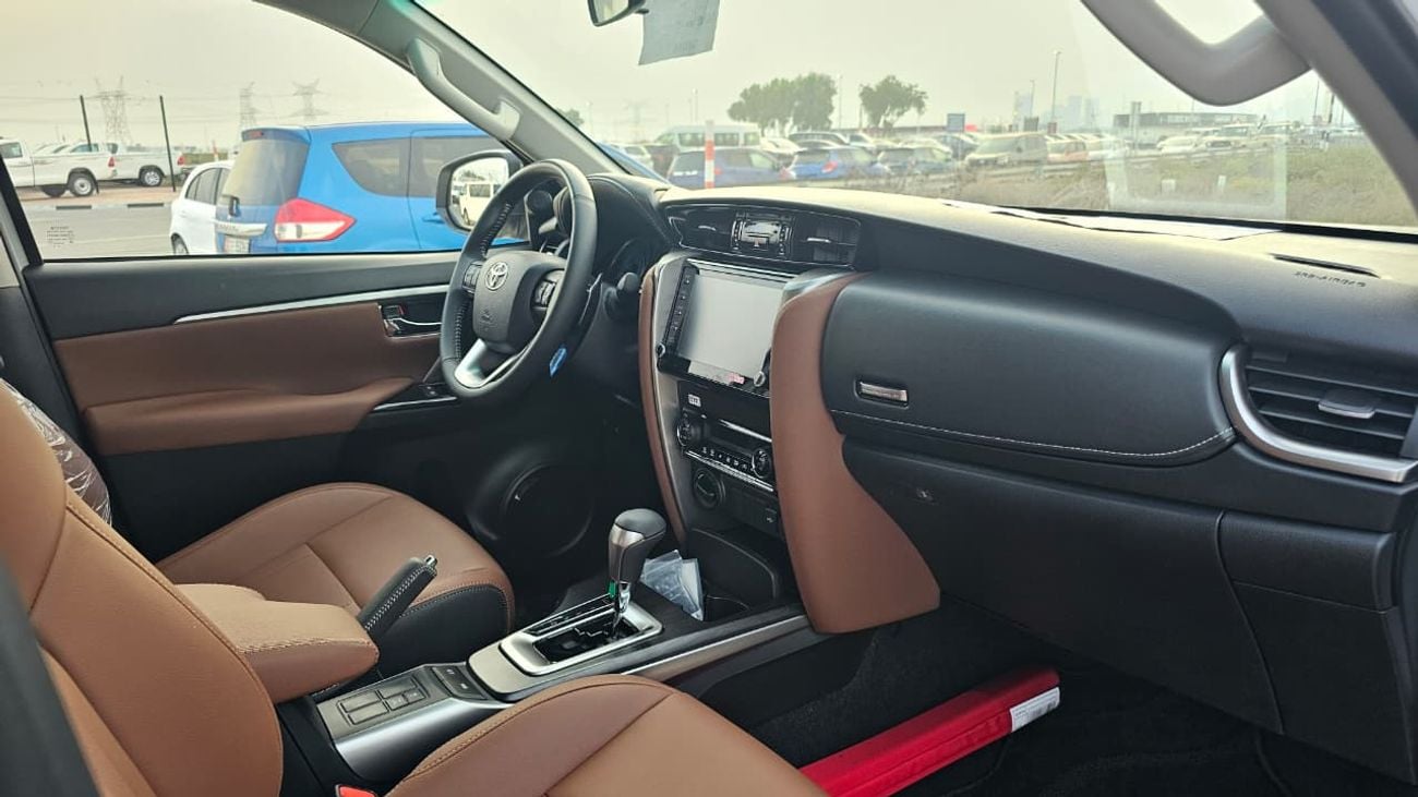 Toyota Fortuner 4.0 GXR V6 2026MODEL WHITE INSIDE BURGUNDY