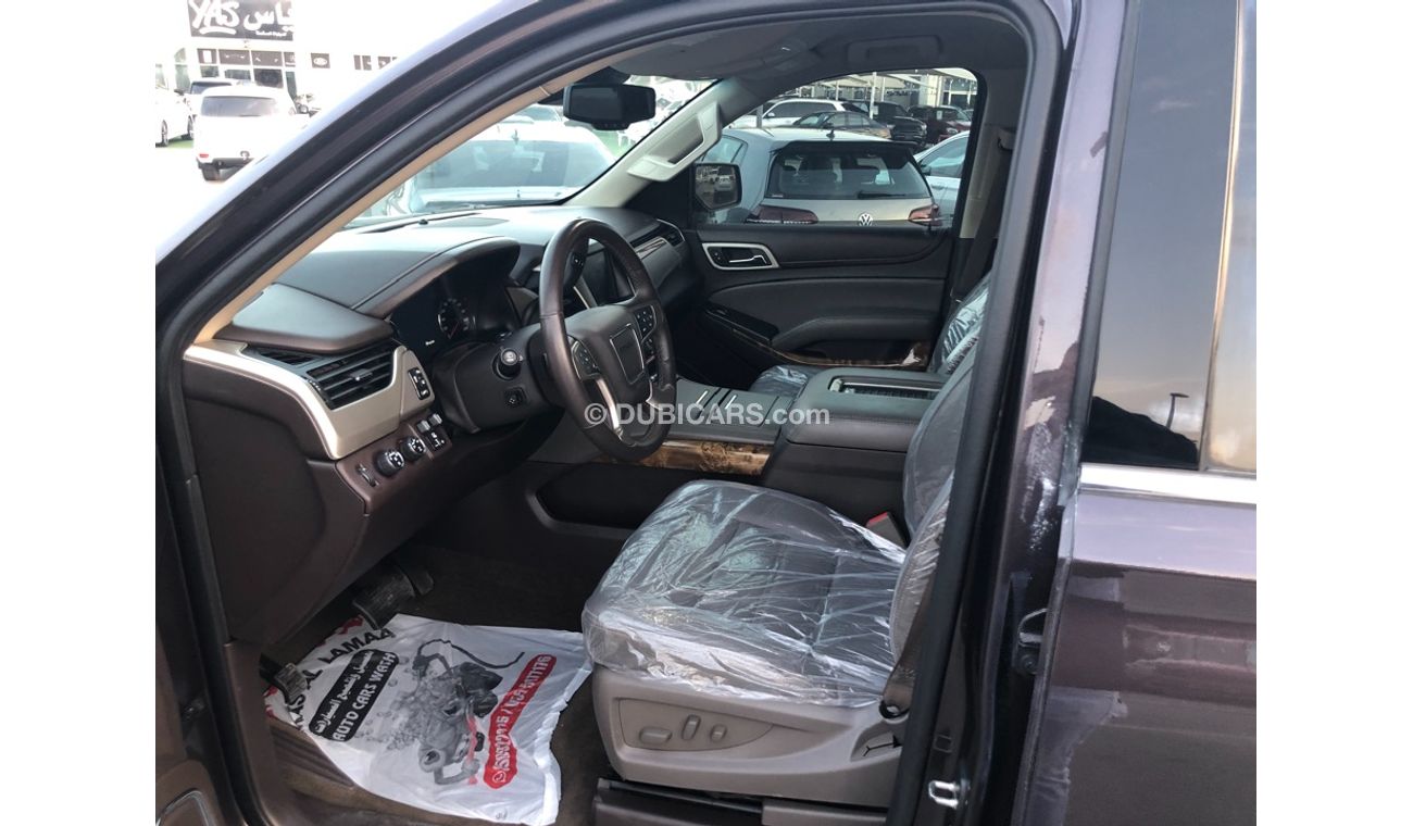 جي أم سي يوكون موديل 2015 فل مواصفات كراسي جلد ومثبت سرعه وتحكم كهربي كامل ونظام صوت ممتاز وكاميرا خلفيه ومدخل اسطو