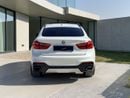 بي أم دبليو X6 AED 1,880 P.M | 0% DOWN PAYMENT | BMW X6 XDRIVE35I M KIT | AGENCY SERVICE HISTORY | 2019 | GCC SPECS