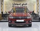 Volkswagen Tiguan SEL EXCELLENT DEAL for our Volkswagen Tiguan 2.0 TSi 4Motion ( 2014 Model ) in Red Color GCC Specs