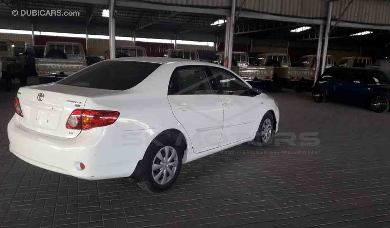 تويوتا كورولا 1.6L, 15" Tyres, Xenon Headlights, Fabric Seats, Power Steering, Front A/C (LOT # 7103)