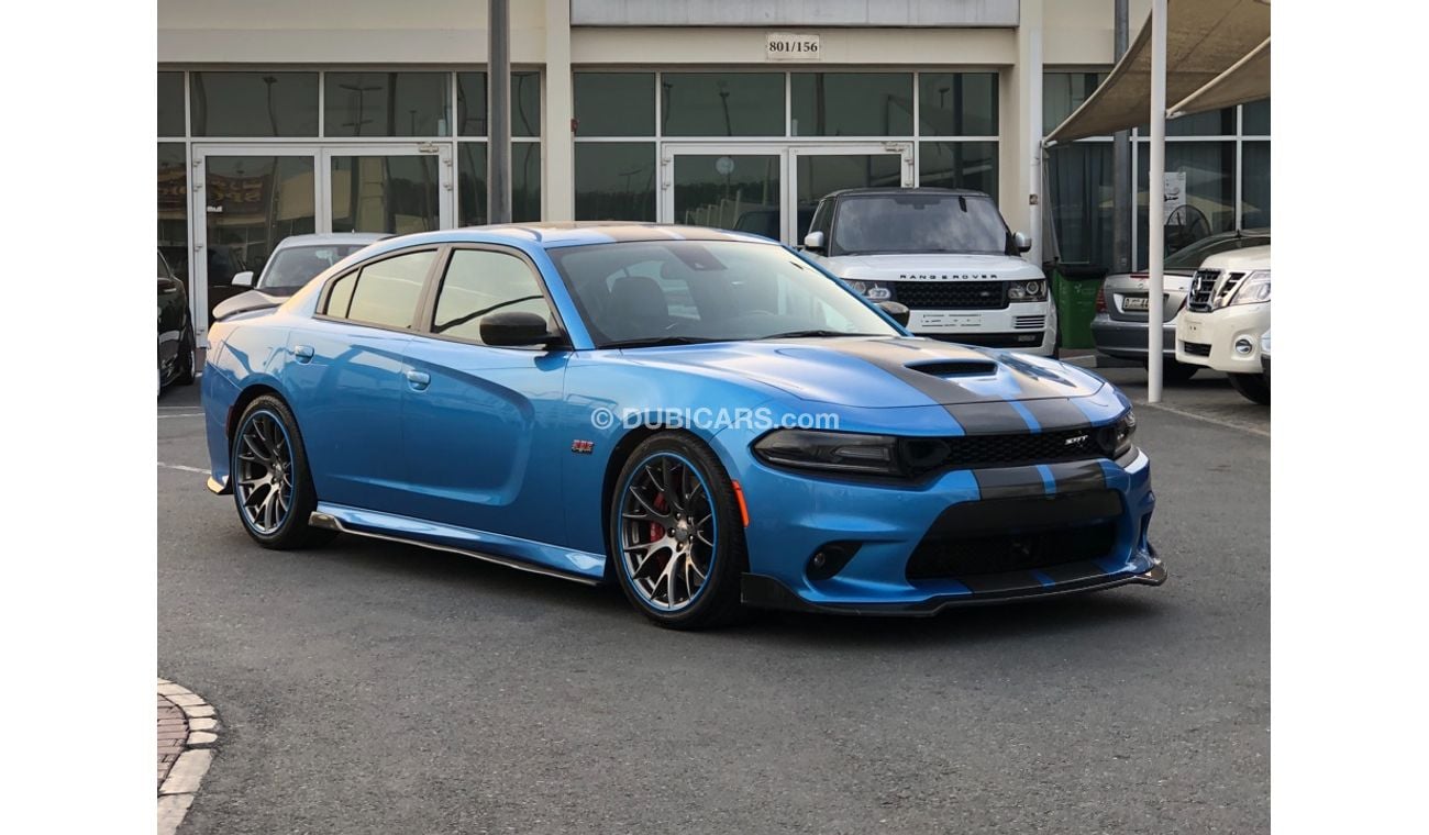 دودج تشارجر موديل 2015 خليجي فل مواصفات كراسي جلد ومثبت سرعه وتحكم كهربي كامل ونظام صوت ممتاز وكاميرا خلفيه