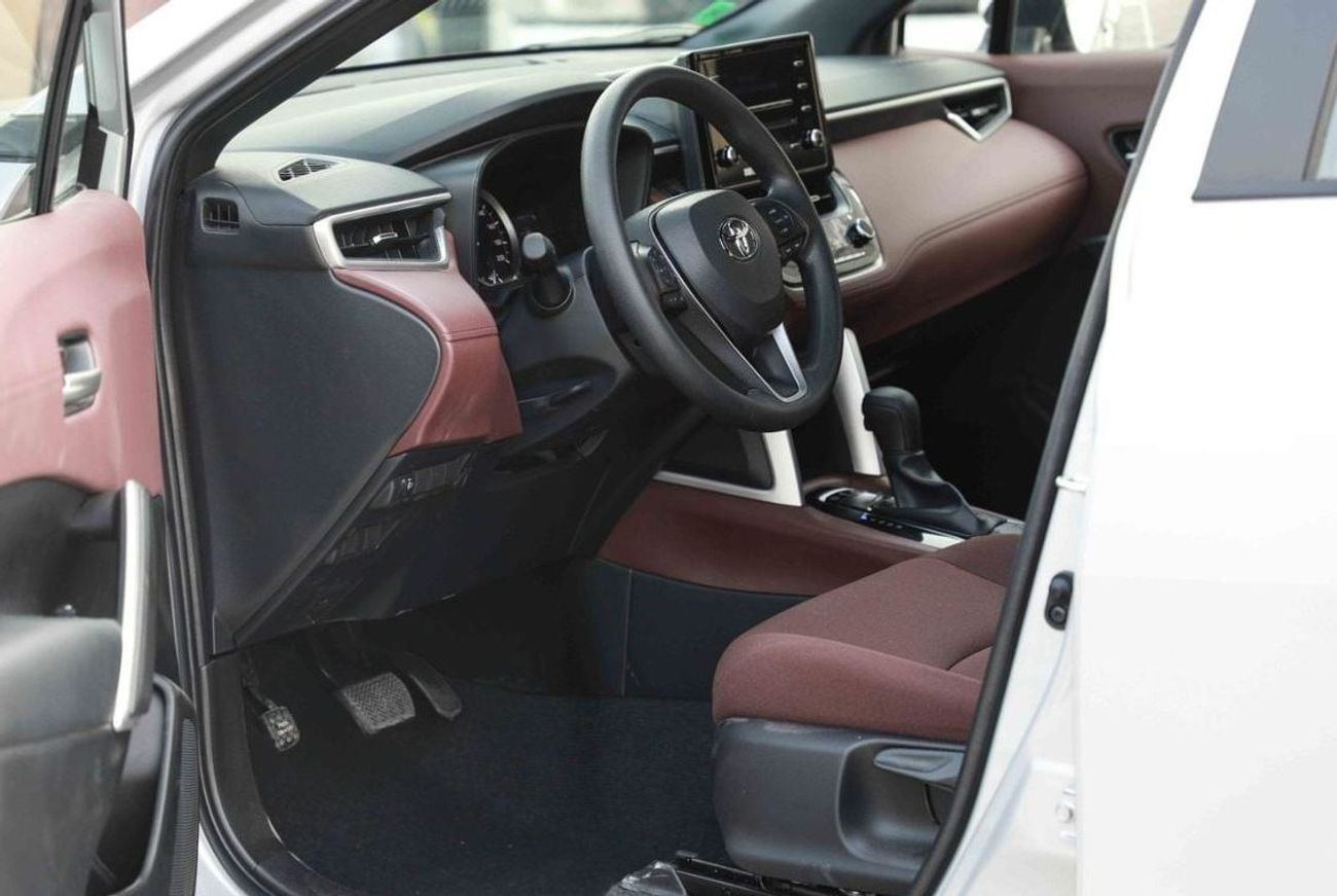 تويوتا كورولا كروس 2024 TOYOTA COROLLA CROSS 1.8 Hybrid MID - SILVER inside RED | Export Only