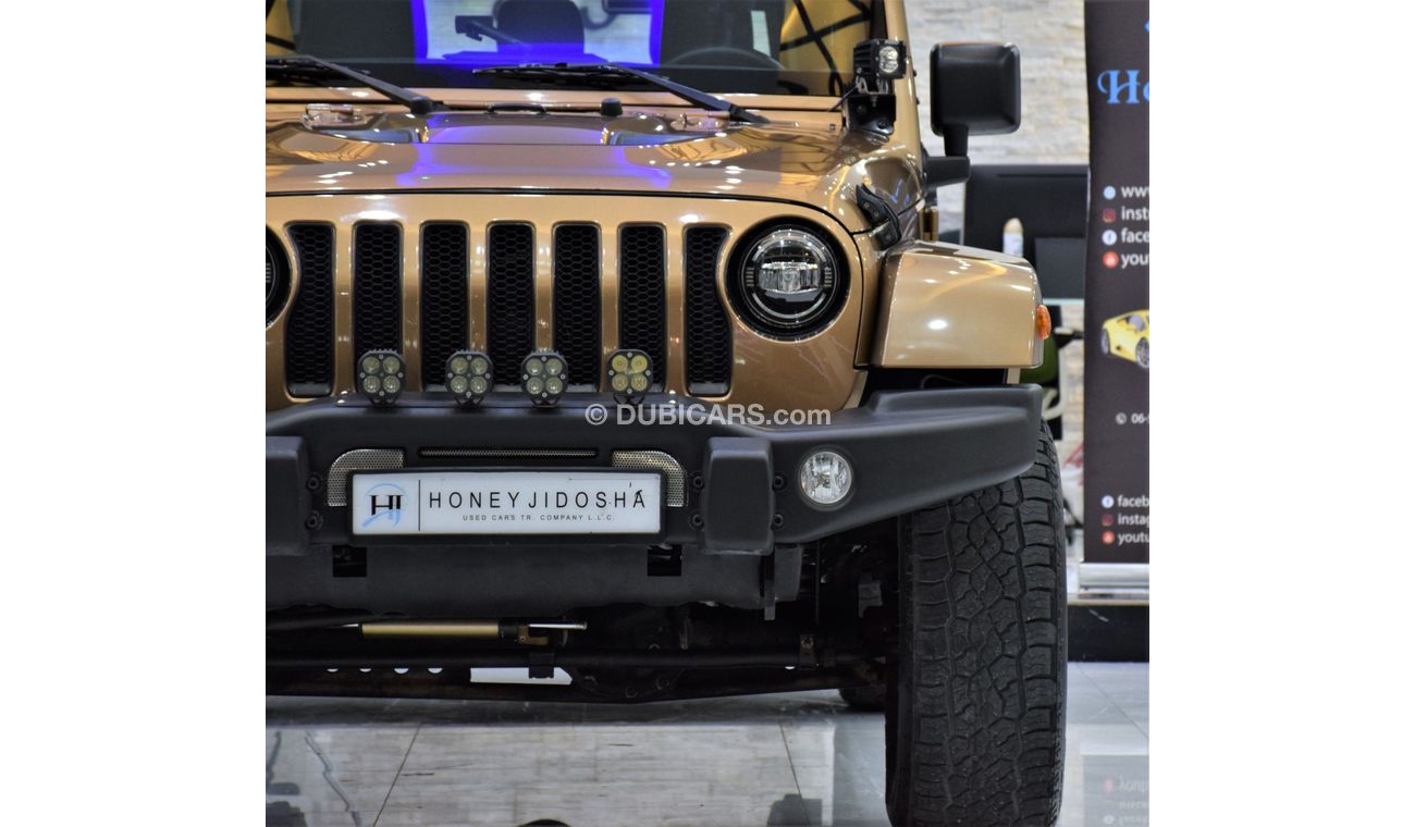 Jeep Wrangler Sahara EXCELLENT DEAL for our Jeep Wrangler UNLIMITED SAHARA 4x4 ( 2015 Model! ) in Brown Color! GCC