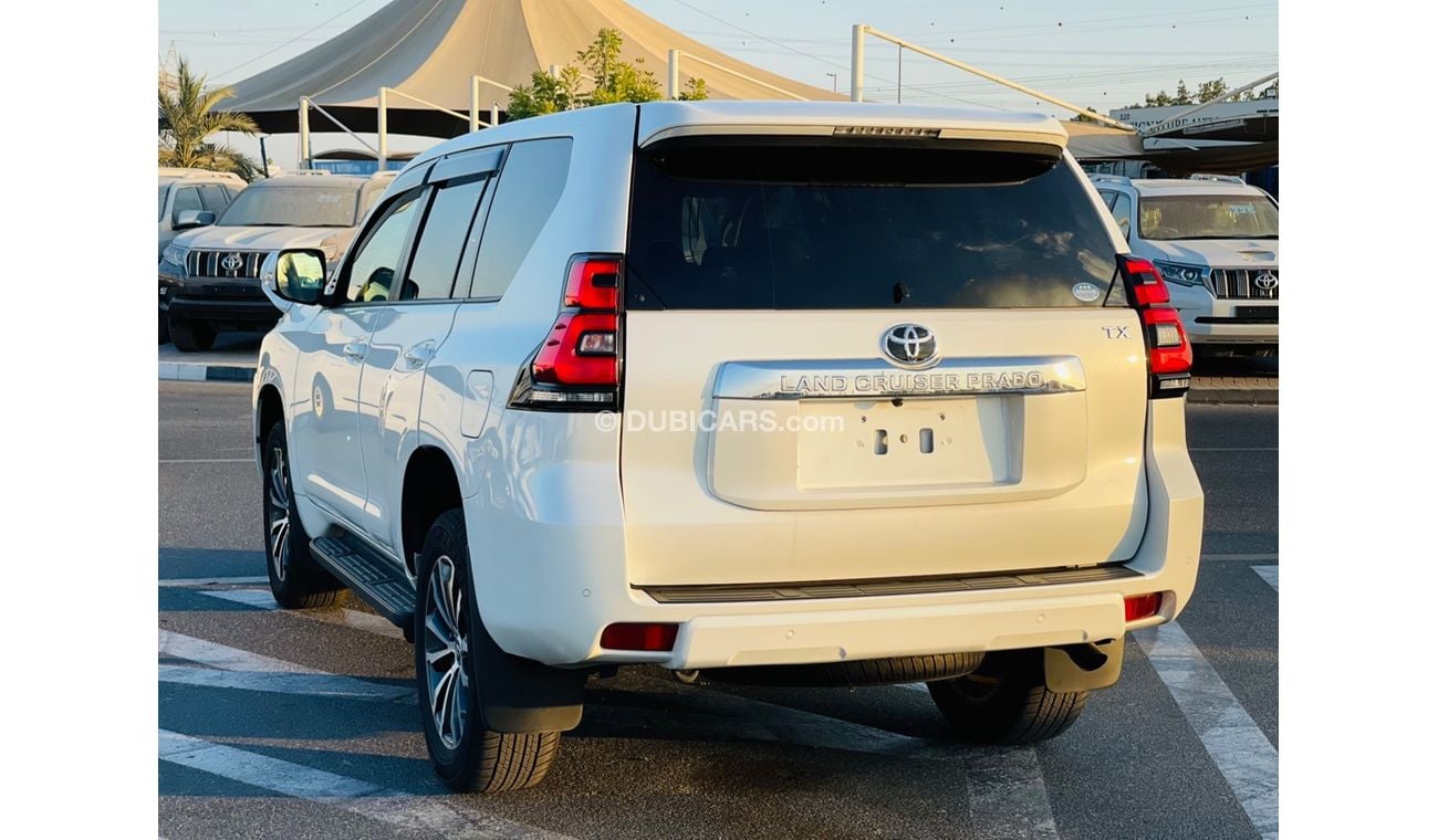 Toyota Prado Toyota prado Petrol  engine 2.7 model 2018 from japan white color 7 seater car very clean and good c