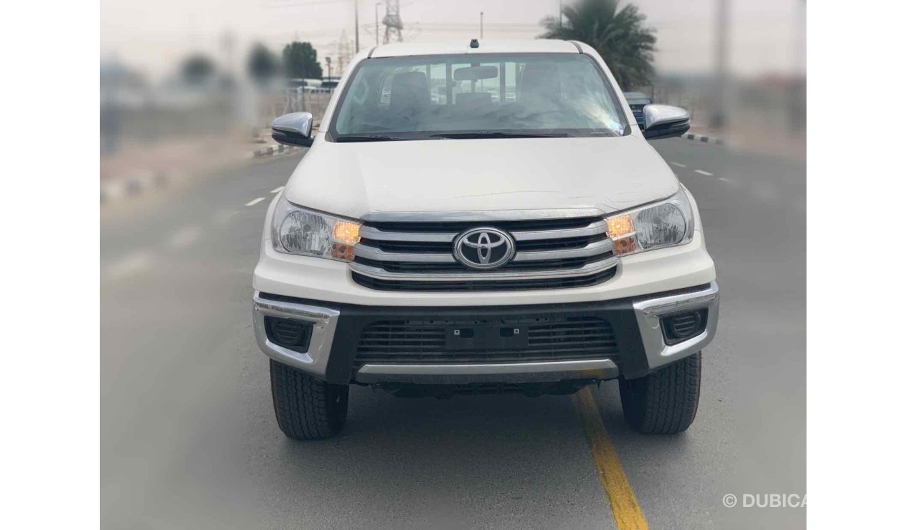 Toyota Hilux SR5 — 2400cc — 4WD — DIESEL -- WIDE BODY — POWER WINDOWS — SIDE STEPS — DOUBLE AC — ELCTRICAL CHEOME