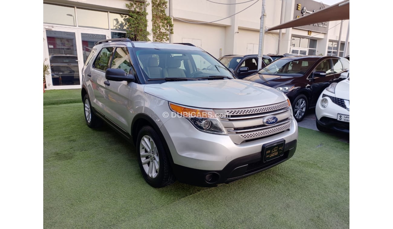 Ford Explorer 2014 model GCC, camera screen, cruise control, wheels, sensors, rear spoiler, in excellent condition