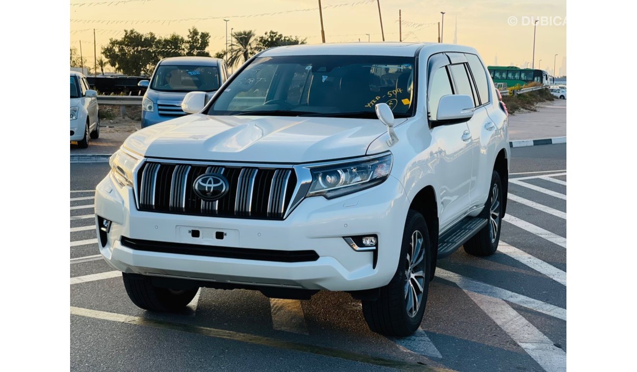 تويوتا برادو Toyota prado Petrol  engine 2.7 model 2018 from japan white color 7 seater car very clean and good c