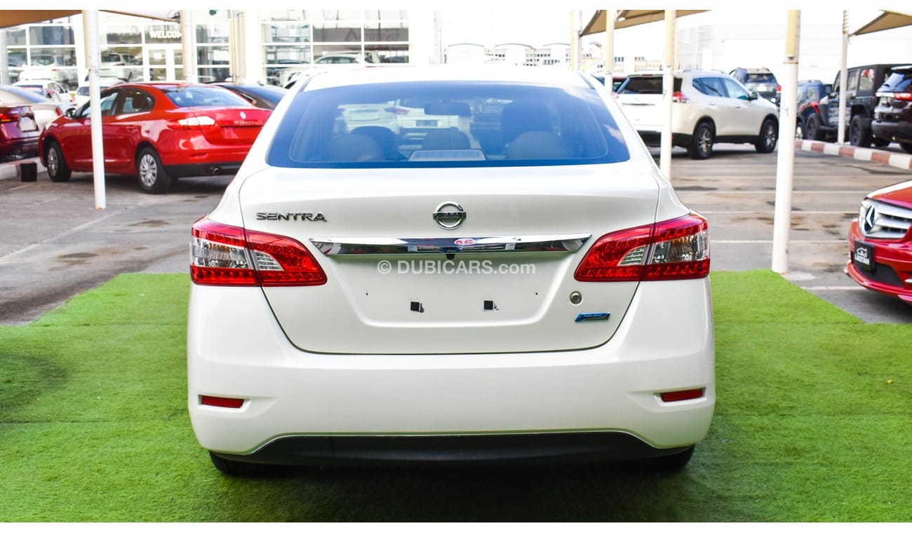 Nissan Sentra GCC, 2016 model, without accidents, white color, beige leather interior, Android screen, rear camera