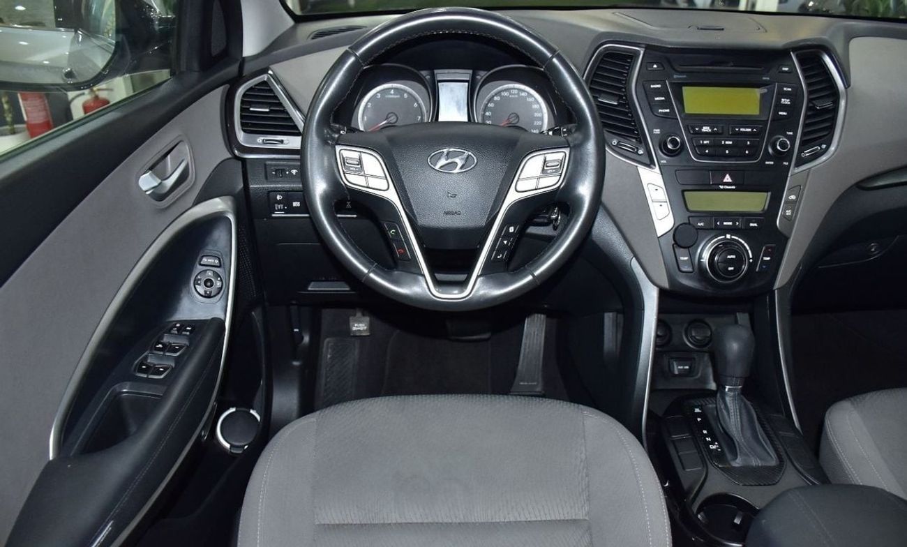 Hyundai Santa Fe EXCELLENT DEAL for our Hyundai SantaFe 4WD V6 ( 2016 Model ) in Silver Color GCC Specs