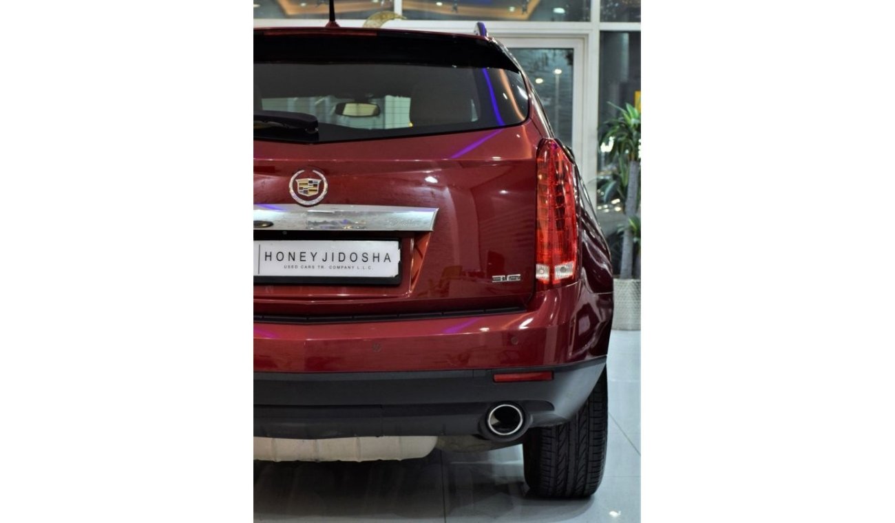 Cadillac SRX EXCELLENT DEAL for our Cadillac SRX4 3.6 ( 2015 Model! ) in Red Color! GCC Specs