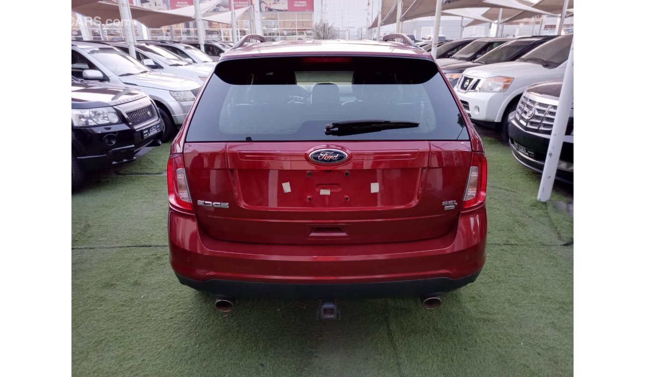 Ford Edge 2013 GCC model, red color, cruise control, leather, electric chair, rear camera screen, in excellent