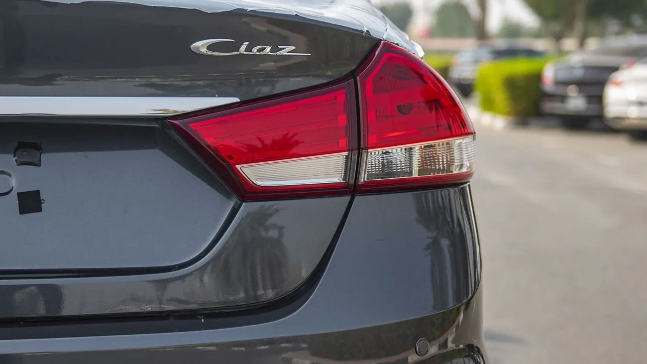 Suzuki Ciaz ALLOY RIMS, PUSH START + REAR VIEW CAMERA, SMALL DISPLAY IN CETRE VIEW MIRROR, CRUISE CONTROL