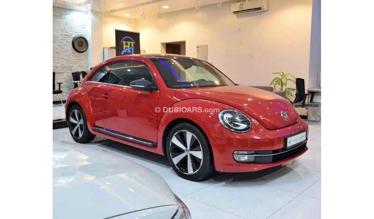 Volkswagen Beetle Turbo S Turbo S EXCELLENT DEAL for our Volkswagen Beetle TURBO ( 2015 Model! ) in Red Color! GCC Spe