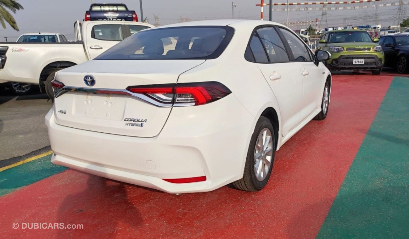 تويوتا كورولا 2023 Hyprid 1.8L petrol 4X2 FWD White color