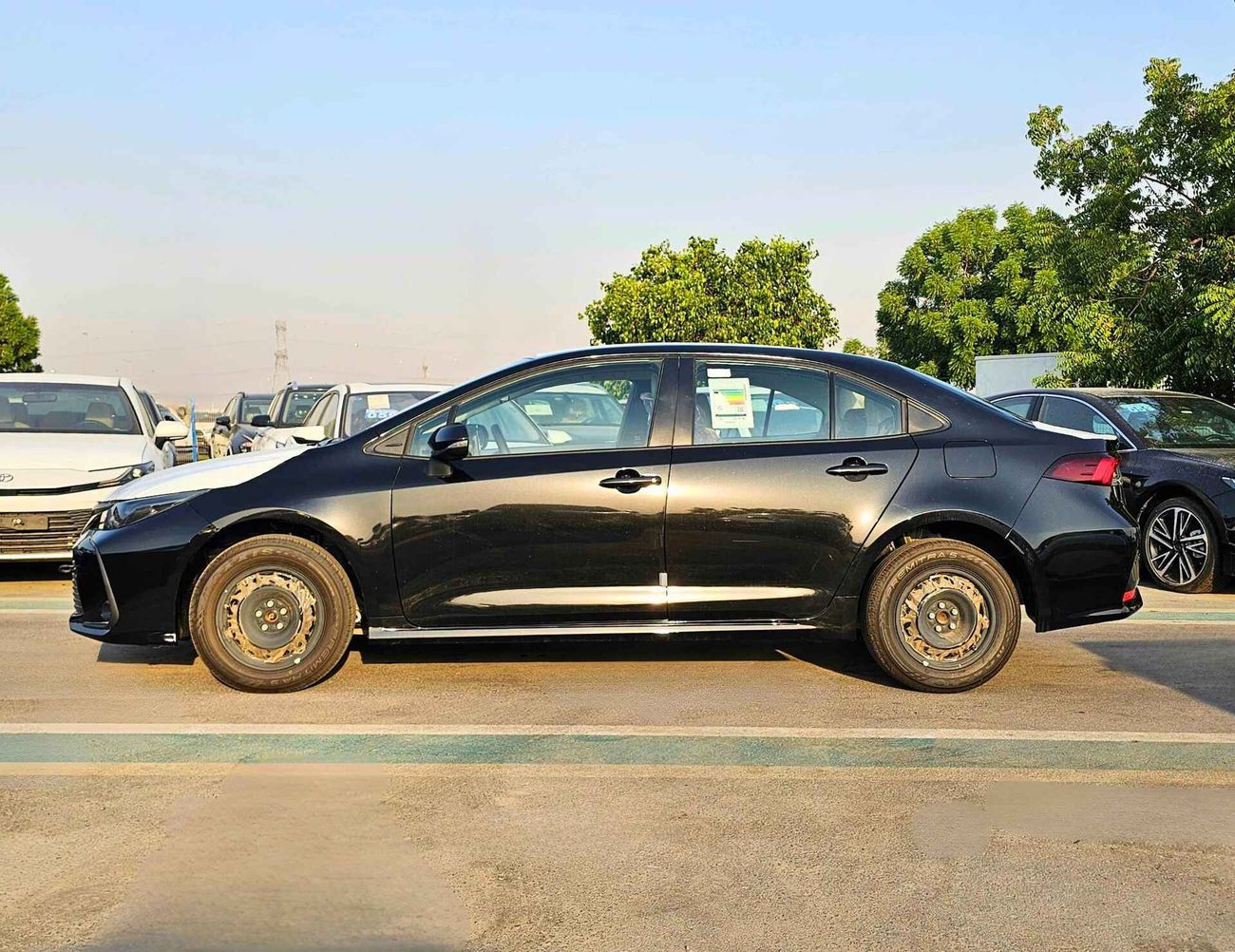 Toyota Corolla XLI E / 1.6L V4 PETROL / DVD / REAR A/C (CODE # XLI)