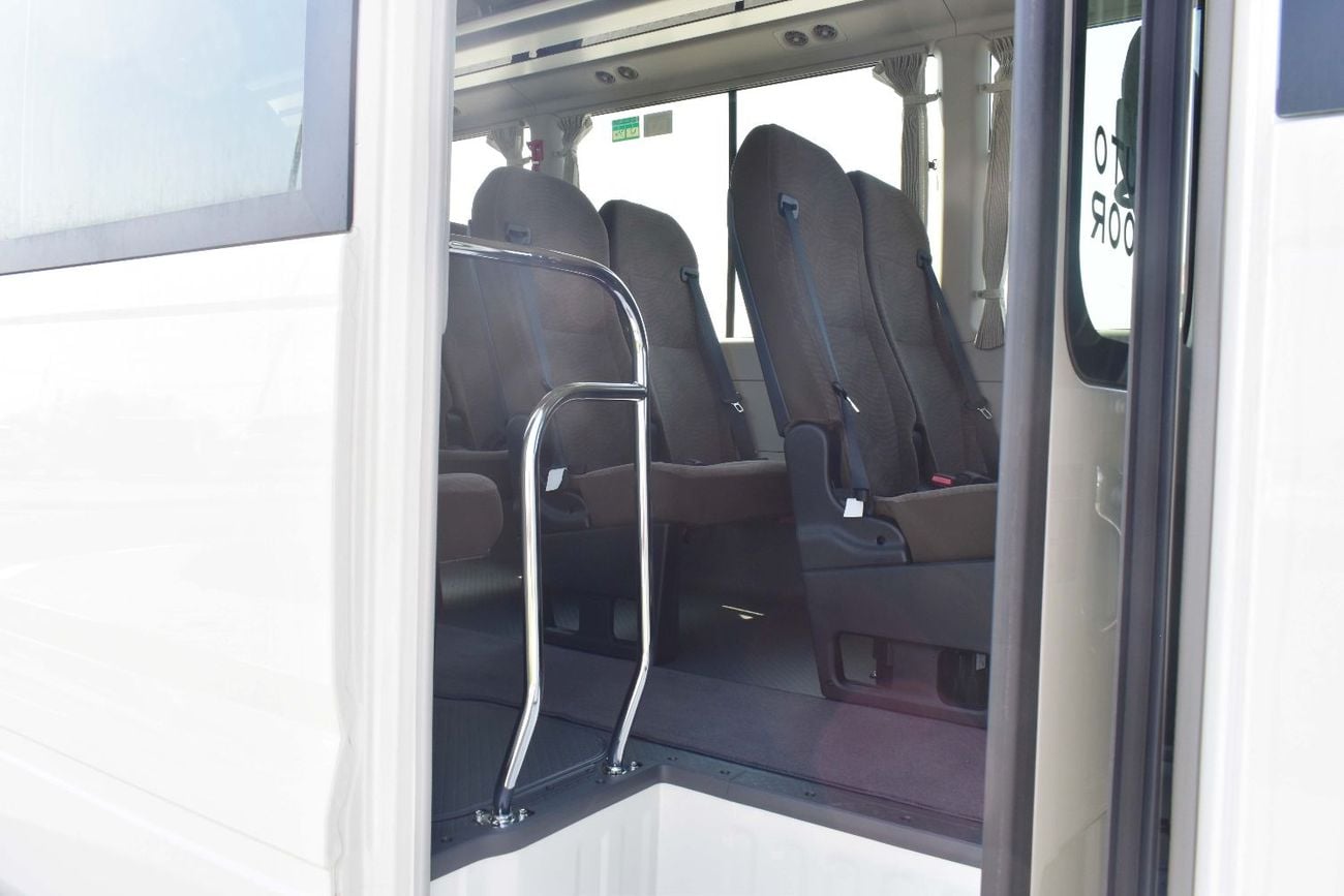 Toyota Coaster 2.8L TURBO DIESEL A/T (WITH BAGGAGE RACK AND CURTAINS)