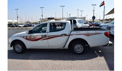 Mitsubishi L200 Std Mitsubishi L200 D/c Pick up 4x2 Diesel, Model:2012. Excellent condition