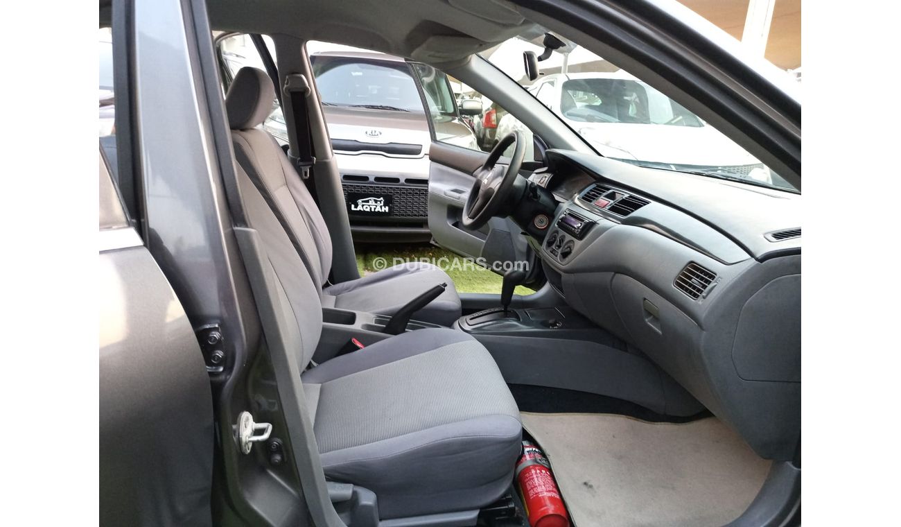 ميتسوبيشي لانسر 1300 سى سى خليجى بدون حوادث أوتوماتيك جناح خلفى تكييف باور راديوFM  بحالة ممتازة